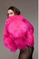 Women's natural llama fur coat in bright pink